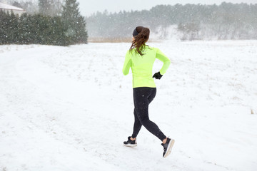 woman running outdoors in winter