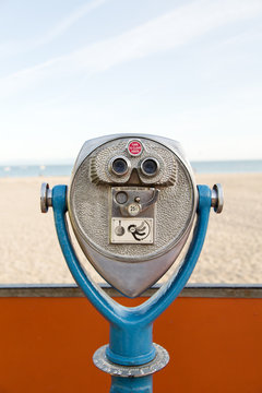 Boardwalk binoculars overlooking the beach