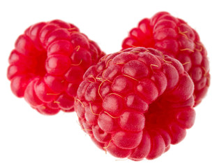 ripe raspberries isolated on white background close up