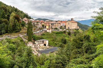 Fototapeta na wymiar Cadegliano Viconago with cemetery below, is a small village located above Ponte Tresa in the province of Varese, Italy