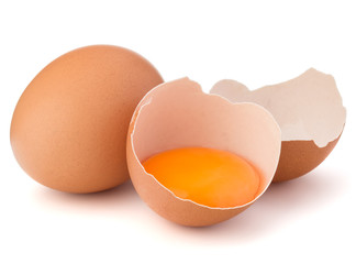 Broken egg in eggshell half and raw egg isolated on white background cutout