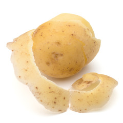 peeled potato tuber with peel spiral isolated on white background cutout