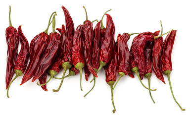 Dried red chili or chilli cayenne pepper isolated on white  background cutout