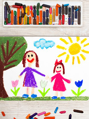 Obraz na płótnie Canvas Photo of colorful drawing: Happy single mother with her daughter