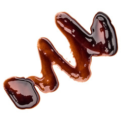 Chocolate syrup drop isolated on white background. Top view. .