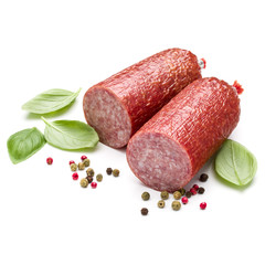 Salami smoked sausage, basil leaves and peppercorns isolated on white background cutout