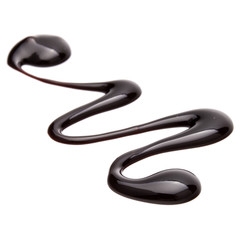 Chocolate syrup drop isolated on white background