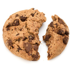 One broken Chocolate chip cookie isolated on white background. Sweet biscuit crumbs. Homemade pastry.