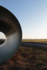 Large concrete pipes waiting for infrastructure work.