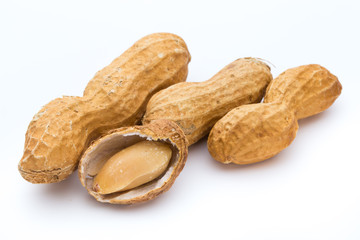 Dried peanuts on the white background.