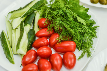 ripe fresh vegetables close-up. tomatoes cucumbers onion