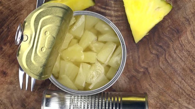 Homemade Pineapple pieces (preserved) (rotating) as detailed 4K UHD footage (seamless loopable)