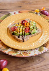 Avocado Toast with tomato garnish