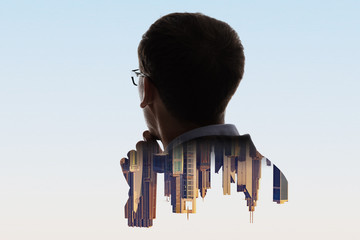 Digital Composite Of City And Businessman Portrait