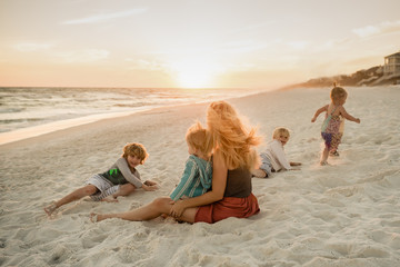 Mother with children at beach
