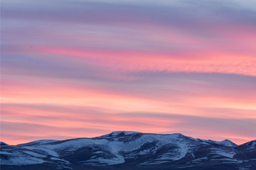 amazing view of plain at root of mountains at fairy pink sunset 