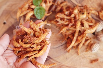Fried fish is tasty on wood background