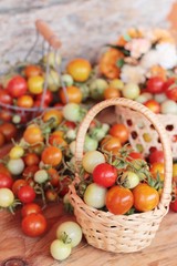 Fresh tomatoes for cooking on wood background