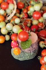 Obraz na płótnie Canvas Fresh tomatoes for cooking on wood background