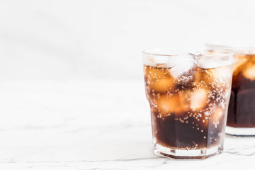 glass of cola with ice