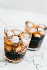 glass of cola with ice