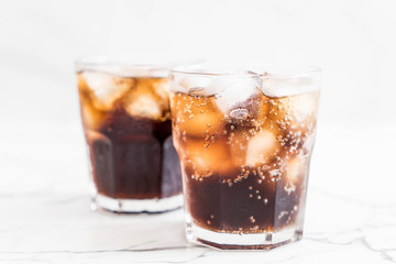 glass of cola with ice