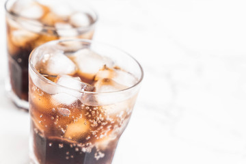 glass of cola with ice