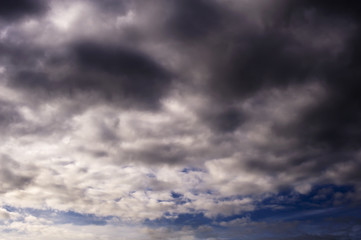 Naklejka na ściany i meble sky with dark clouds background