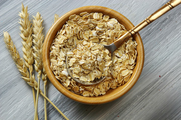 Overhead view of Oats on wooden background