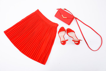 Red shoes ,red skirt ,bag on a white background