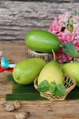 Fresh lemon on wood background