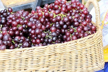 Fresh fruit black grapes in the market