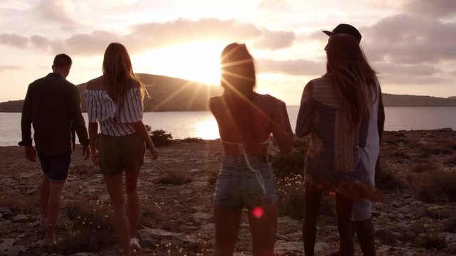 Friends Walking On Cliff Watching Sunset Shot On R3D