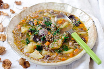 Mushroom soup with buckwheat flakes