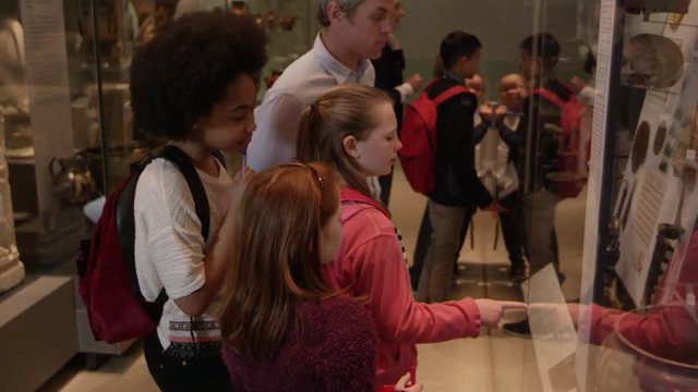 Students Look At Objects In Cases On Museum Trip Shot On R3D