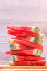 Fresh sliced watermelon  on wooden table.