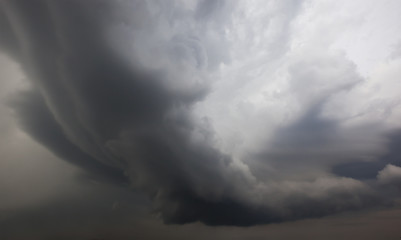 Obraz premium Grey clouds in the blue sky