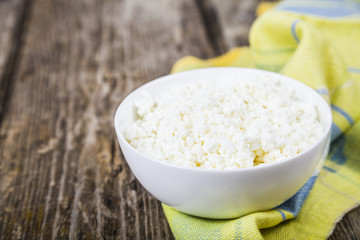 Cottage cheese on a wooden table