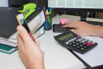 Businessman pressing computer button - financial analyzing concept
