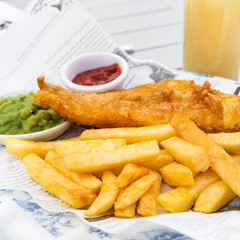  Fish and Chips with mushy peas served in the Pub