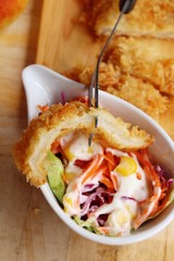 Fried dory fish with vegetable salad delicious