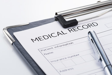 Medical record and pen on white background. Result of medical. Concept image of medical examination.
