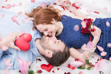 beautiful bride and groom with heart kissing 