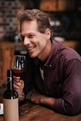 man drinking wine