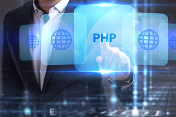 The concept of business, technology, the Internet and the network. The young entrepreneur has found what he needs: PHP