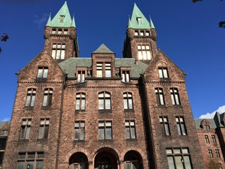 Basilica on blue sky, unidentified people.