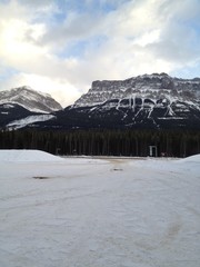 Mountain with river and blue sky.