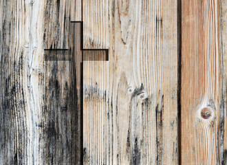 Brown old christian religion symbol cross shape as sign of belief on a grungy textured church wall or rustic aged background or backdrop, copy space for conceptual spirituality or resurrection design