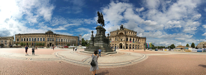 Obraz premium Dresden, Germany - August 4, 2017: The Opera House is a highlight of the architectural ensemble of the Theater Square of the Saxon capital.