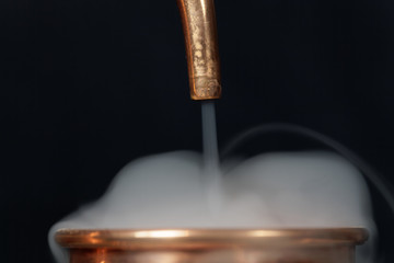 Obraz na płótnie Canvas Copper pipe with steam